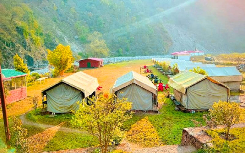 Swiss tents riverside camping setup at Rishikesh camp